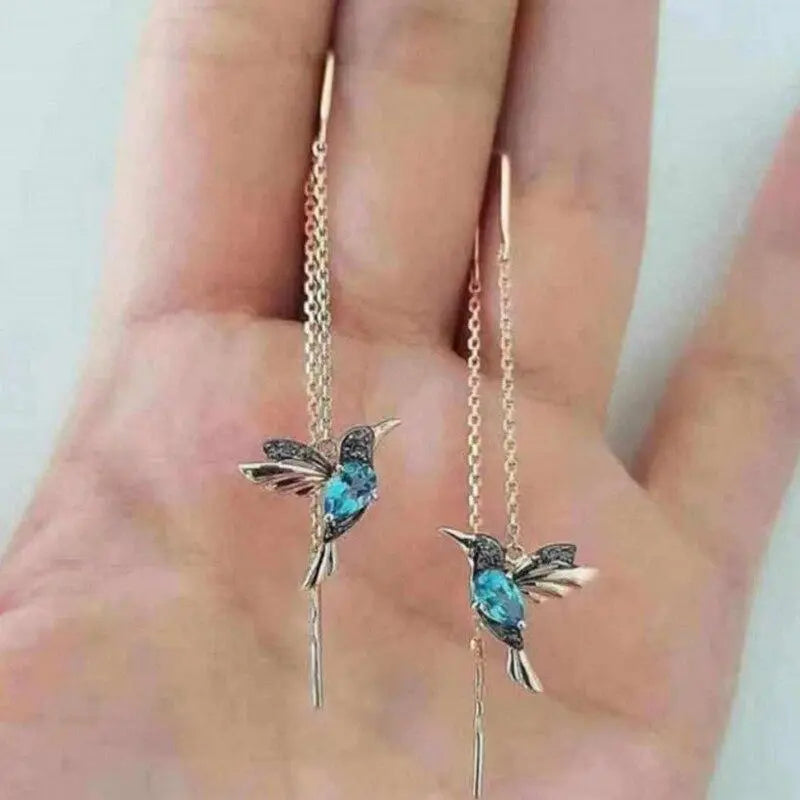 Pendientes de hilo con colibrí dorado y cristales