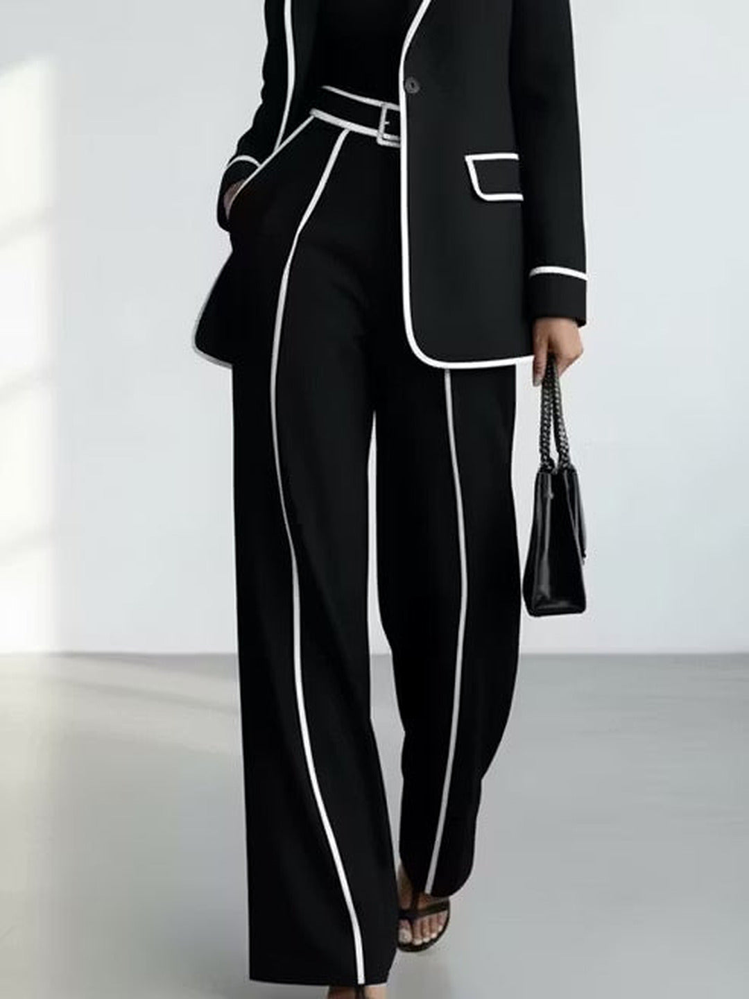 Clementina | Conjunto de blazer y pantalón con ribetes a contraste, negro · fotografía 6